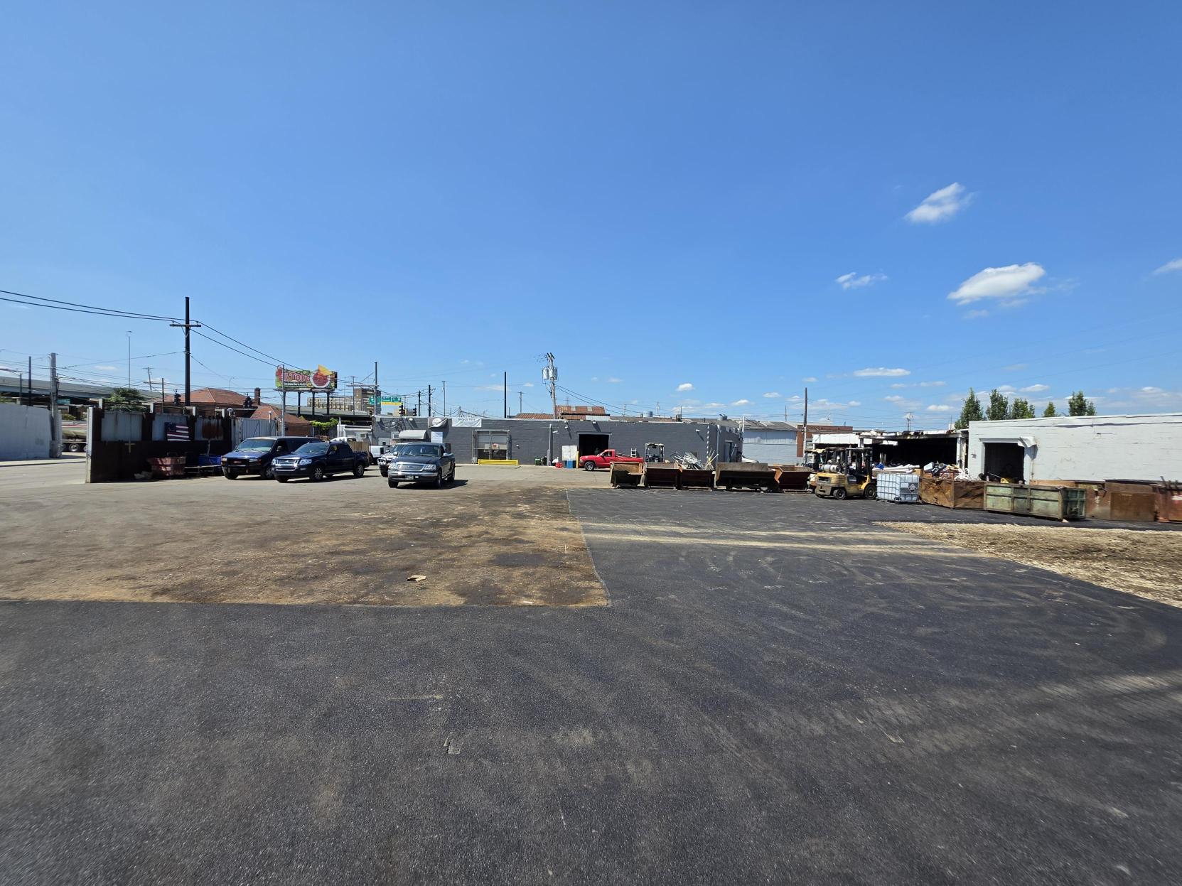 The A&B Iron and Metal yard on Washington Street in Dayton with containers staged along the building